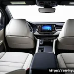 Home 13 현대 아이오닉 5의 실내 공간 - **Prompt: "An ultra-modern and spacious interior of a Hyundai Ioniq 5, viewed from the rear passenge...
