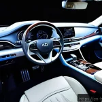 Home 21 현대 그랜저의 고급 사양 트림 - A luxurious car interior showcasing the Hyundai Grandeur’s premium materials: genuine leather uphols...